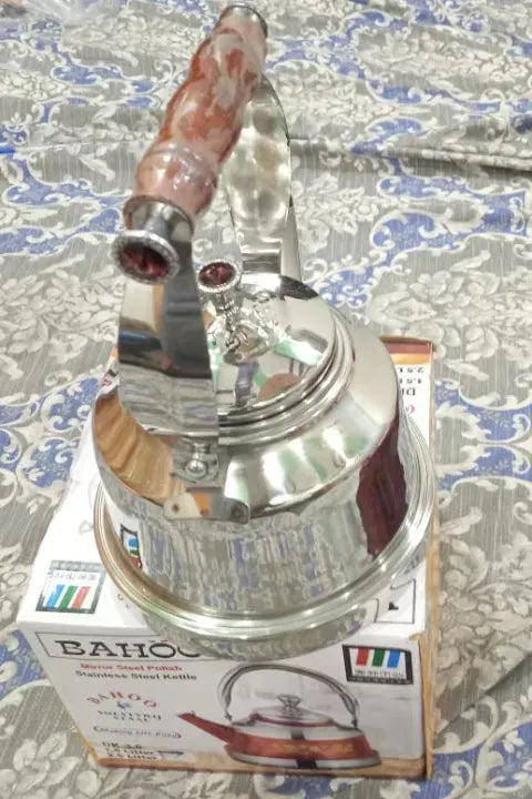 stainless steel kettle with wood handle